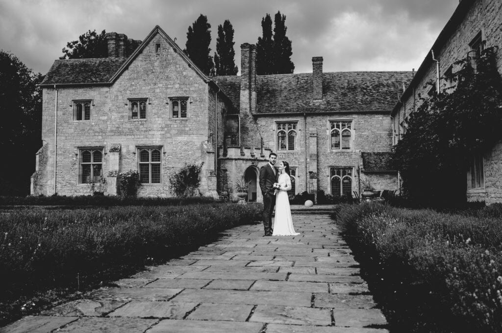 Bride and groom outside Notley Abbey