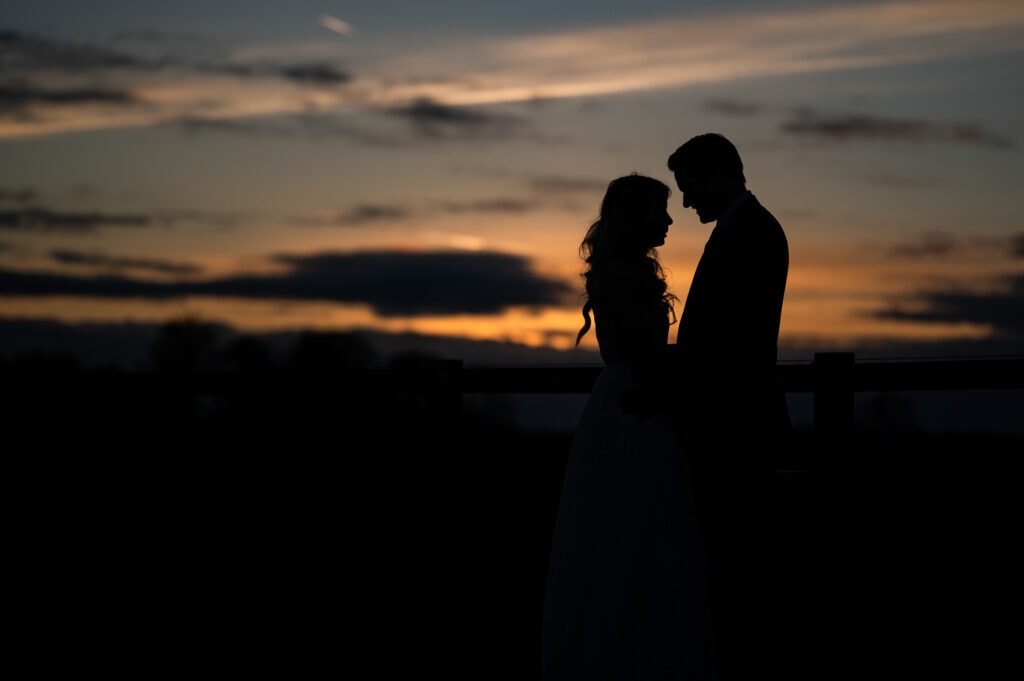 Wedding couple silhouette at sunset